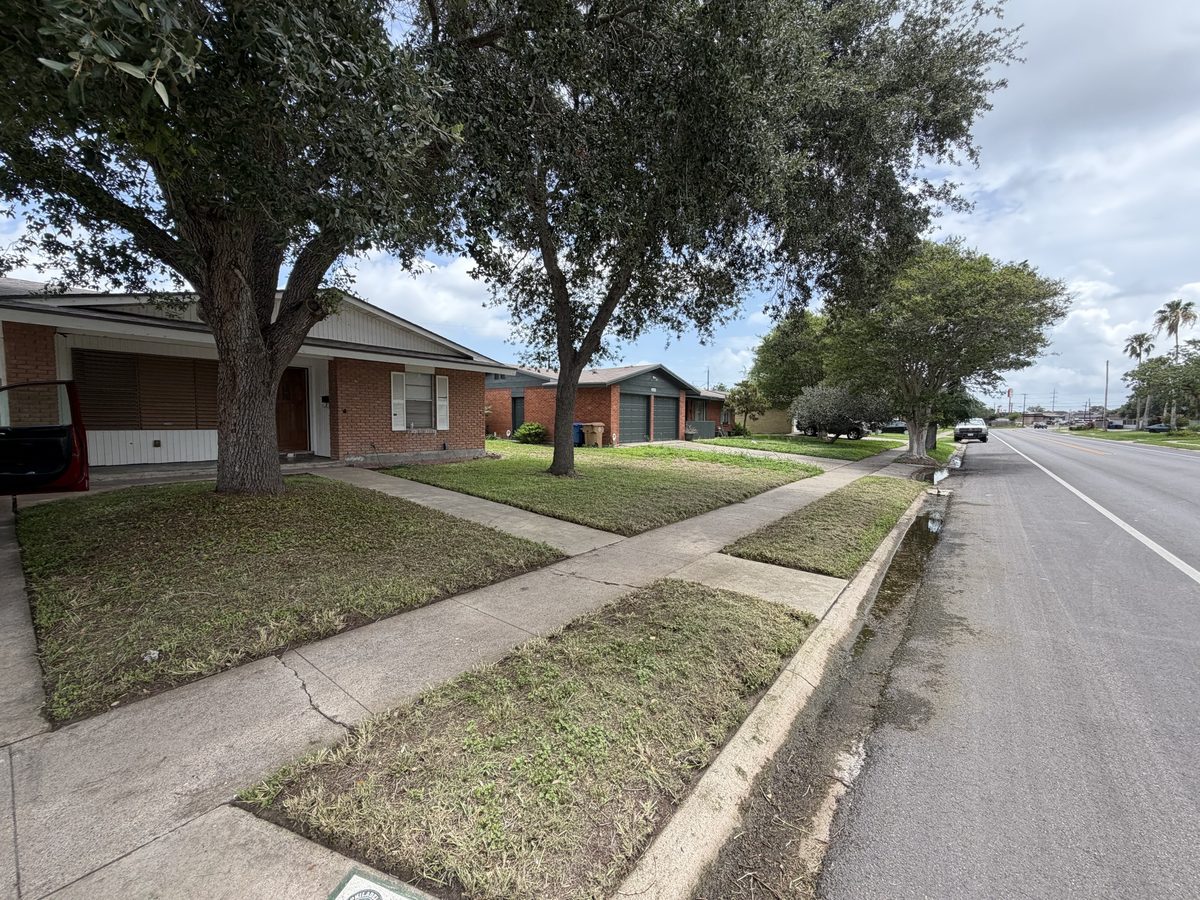 Clean lawn edging along sidewalk