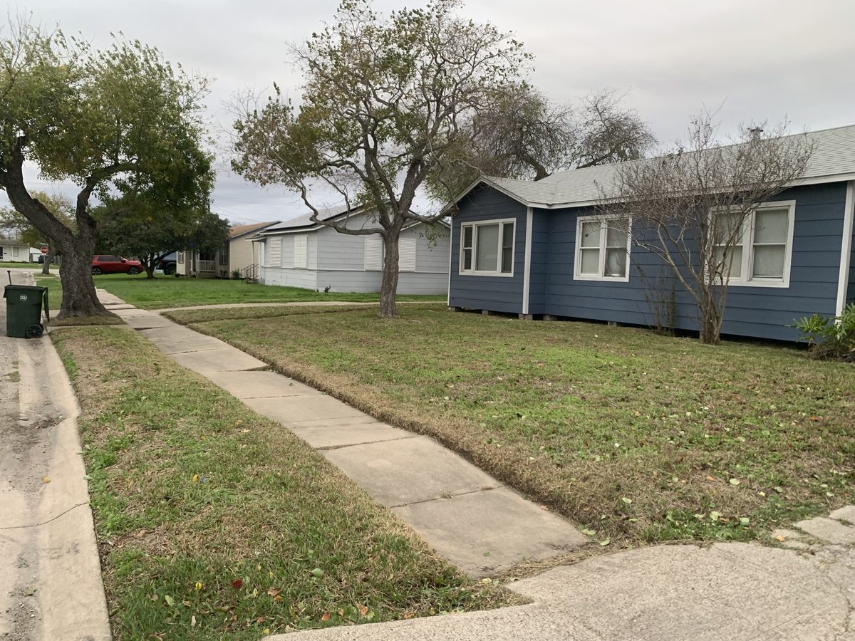 Clean sidewalk edging after PrimeEdge mowing service